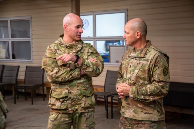 U.S. Army Command Sgt. Maj.  Dale Box, command sergeant major assigned to 2nd Battalion, 35th Infantry Regiment, 3rd Infantry Brigade Combat Team, 25th Infantry Division, speaks with a member of 1st Brigade New Zealand Army  March 29, 2023 at Waiouru Military Camp, North Island, New Zealand. Soldiers and Officers from 3rd Infantry Brigade Combat Team and 1st Brigade New Zealand Army worked together to enhance relationships and understanding and to prepare for upcoming training exercises across the Indo-Pacific region. 
