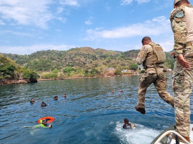 Sgt. 1st Class Class Daniel Delgado and Sgt. 1st Class Jose Cardenas of the Security  Assistance Training Management Organization (SATMO) supported partner forces from the Panamanian Joint Maritime Task Force in conducting a Water Survival Course from April 10-14 at Rodman Naval Yard in Panama City, Panama. Their support included classroom instruction, a comprehensive risk assessment, and assistance in leading a practical exercise on open water. (Pictured) Training included treading water in body armor. 