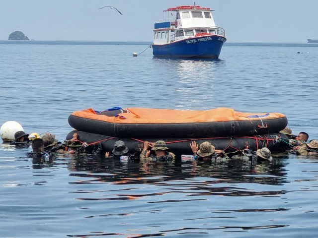 Sgt. 1st Class Class Daniel Delgado and Sgt. 1st Class Jose Cardenas of the Security Assistance Training Management Organization (SATMO) supported partner forces from the Panamanian Joint Maritime Task Force in conducting a Water Survival Course...