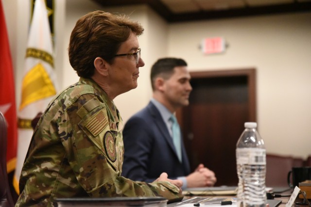 Air Force Gen. Jacqueline Van Ovost, commander of U.S. Transportation Command, listens to a brief on ASC’s logistical support to Poland and its wartime readiness April 10, at Rock Island Arsenal, Illinois.