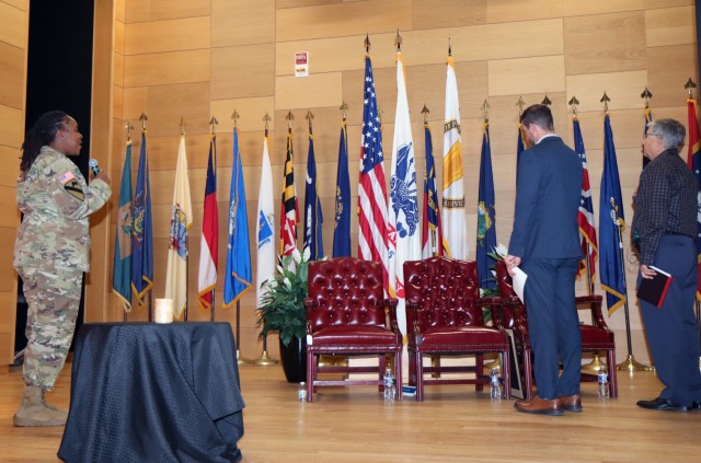 A Soldier sings the National Anthem at a Holocaust Day of Remembrance event hosted by Program Executive Office Intelligence, Electronic Warfare and Sensors at the C5ISR Campus on Aberdeen Proving Ground, Maryland.