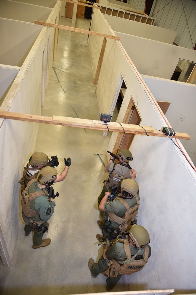 Missouri State Highway Patrol Special Weapons and Tactics team members practice room clearing techniques on April 10 at Training Area 167. Fort Leonard Wood hosted the Missouri SWAT teams April 10 and 11, offering an opportunity to hone their...