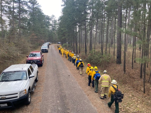 The Basic Wildland Firefighter class prepares to conduct a field exercise of installing a fire line and holding a live burnout during the RRAD annual Wildland Fire Academy