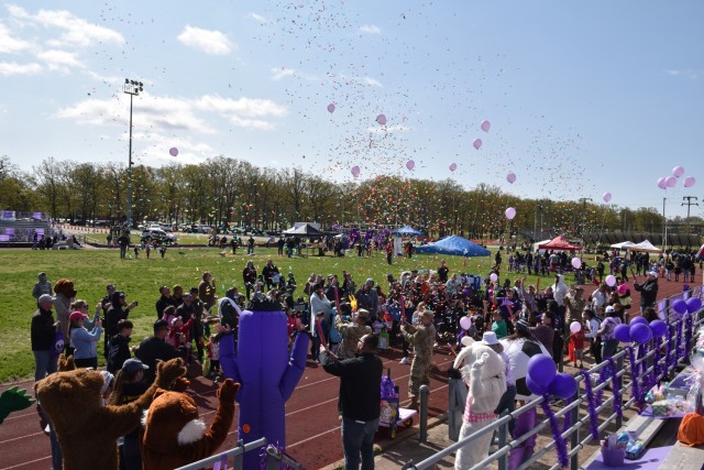Participants gather for the bubbles and balloons launch Saturday on Gerlach Field during Month of the Military Child Palooza.