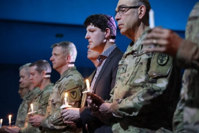 KAISERSLAUTERN, Germany - On Apr. 18, USAG Rheinalnd-Pfalz and 21st Theater Sustainment Command held a Days of Remembrance Observance ceremony to honor the six million Jews and millions of non-Jewish victims persecuted and murdered in the...