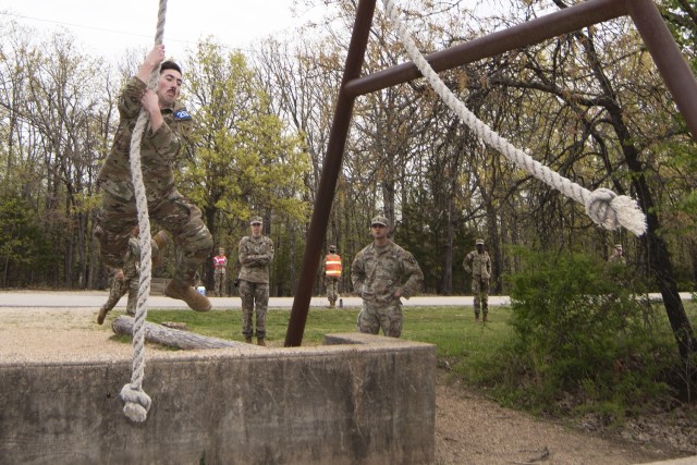 Staff Sgt. Joseph Feola, with the 95th Chemical, Biological, Radiological and Nuclear Company at Joint Base Elmendorf-Richardson, Alaska, completes the Personal Endurance Course on April 18, one of nearly 60 graded events at this year’s Best...