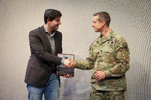 KAISERSLAUTERN, Germany - On Apr. 18, USAG Rheinalnd-Pfalz and 21st Theater Sustainment Command held a Days of Remembrance Observance ceremony to honor the six million Jews and millions of non-Jewish victims persecuted and murdered in the...
