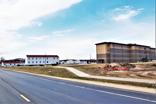 Contractors move third World War II-era barracks to new location