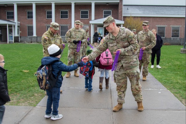 10th Mountain Division soldiers visit local elementary school for Purple Day