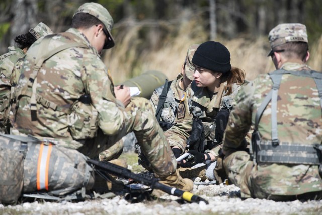 Cadet Mae Martel, from Washington University in St. Louis, practices first-level leadership skills on Saturday at Training Area 246. More than 300 ROTC cadets from eight universities across Missouri and southwest Illinois conducted a...