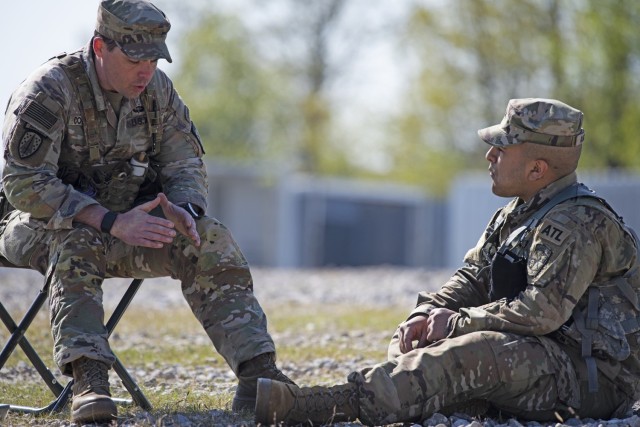 Maj. Stephen Connell, Assistant Professor of Military Science at Washington University in St. Louis, counsels Cadet Robert Angulo, from the Missouri University of Science and Technology in Rolla, Missouri, on his leadership performance on Saturday...
