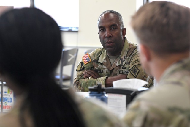 Brig. Gen. Jason E. Kelly, Fort Jackson commander, listens to ROTC Cadets and junior officers during a speed mentorship session, April 21, during the Lt. Gen. Stephen M. Twitty Leadership Development Forum.