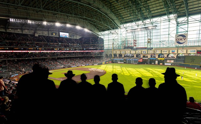 Troopers from 1st Cavalry Division Sustainment Brigade, overlook the Minute Maid Stadium during their ruck march honoring MLB legend Jackie Robinson in Houston, TX, April 16. The ruck march, saw members of the “Wagonmasters” carrying a rucksack weighing 42 pounds in honor of Robinson&#39;s number. The event tested the participants&#39; endurance, strength, and resilience while symbolizing the importance of teamwork and support in achieving shared goals. (Photo by U.S. Army Spc. Cheyne Hanoski)