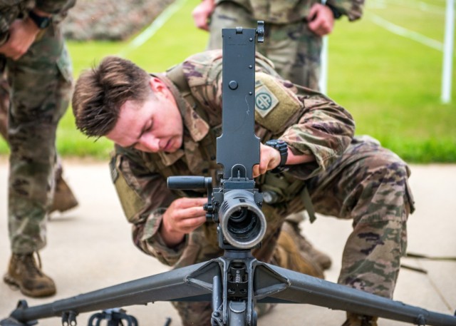 A Soldier is evaluated for competency with a M2A1 .50-caliber machine gun.