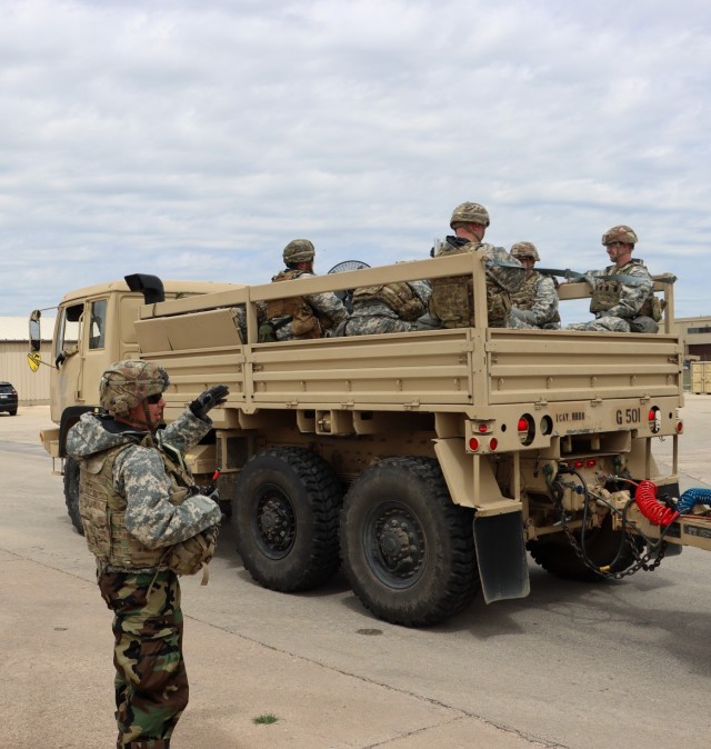1st Cavalry Division Troops participating in the Warfighter 23-04 exercise convoy in military vehicles during a command post jump. For younger Troops serving with division staff sections, this exercise was an opportunity to learn and understand how a division headquarters and staff would operate in a large-scale combat environment. 