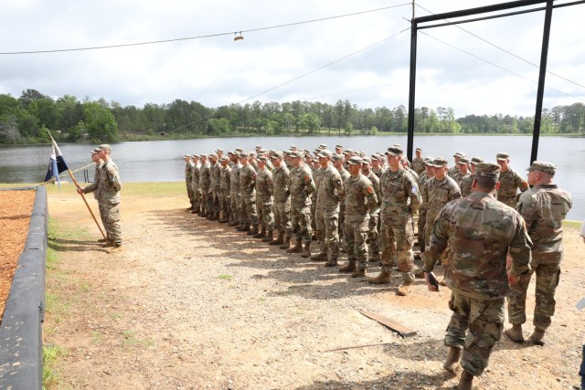 1st Lt. Anna Zaccaria (right), 100th Battalion, 442nd Infantry, shouts the Ranger Creed with her platoon during her Army Ranger School graduation ceremony at Fort Benning, GA, April 28, 2023.