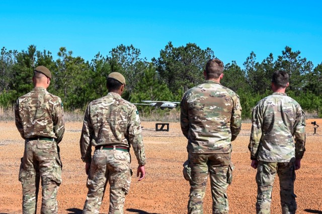 Soldiers watch as an unmanned aerial vehicle takes off during Army Expeditionary Warrior Experiment 23 at Fort Benning, Georgia.