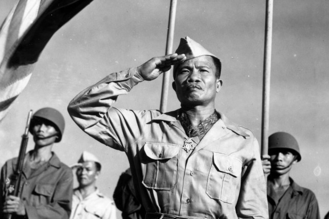 Army Sgt. Jose Calugas salutes while wearing his newly received Medal of Honor at Camp Olivas in the Philippines, April 30, 1945. Born in the Philippines, Calugas joined the U.S. Army&#39;s Philippine Scouts in 1930 at age 23 and was the first Filipino to be awarded the Medal of Honor, receiving it for heroic actions in Bataan province in 1942.