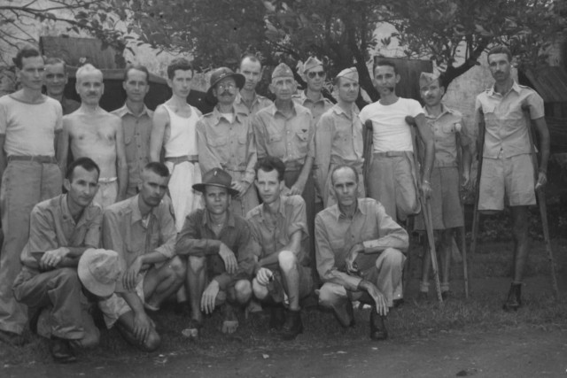Allied prisoners of war pose for a photo after being liberated from the Bilibid Prison in Manila on the Philippine islands of Luzon.