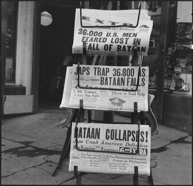 This newsstand, pictured at a corner drugstore in Hayward, Calif., shows newspaper headlines from April 9, 1942, detailing the fall of the Allies during the Battle of Bataan in the Philippines.