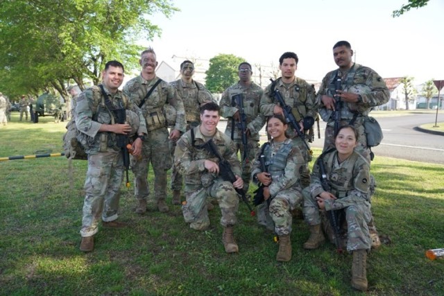 The nine Expert Soldier Badge awardees from units across Japan and Guam, pose for a group photo after all completed a 12-mile ruck in under three hours and after completing disassembling, reassembling, and performing functions check on their assigned M4, on April 28, 2023, on at Sagami General Depot. The competition tested soldiers&#39; skills and expertise in various military tasks, including land navigation, weapons handling, patrolling, medical care, and a grueling 12-mile ruck, all in the hope of earning the coveted badge. Around 200 soldiers participated in this challenging and demanding event, showcasing their commitment and dedication to the U.S. Army.