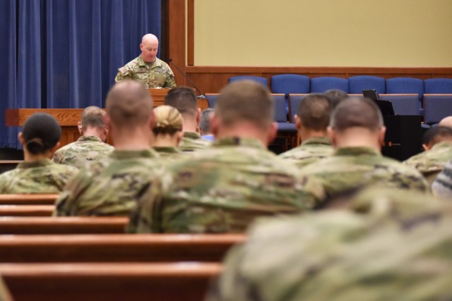 Chaplain (Maj.) Jeremie Vore, with 3rd Chemical Brigade, prays for active-duty service members during the National Day of Prayer service today at Fort Leonard Wood’s Main Post Chapel. More than 60 community members participated in the event, hosted by Fort Leonard Wood and the Maneuver Support Center of Excellence chaplains and chaplain assistants. 