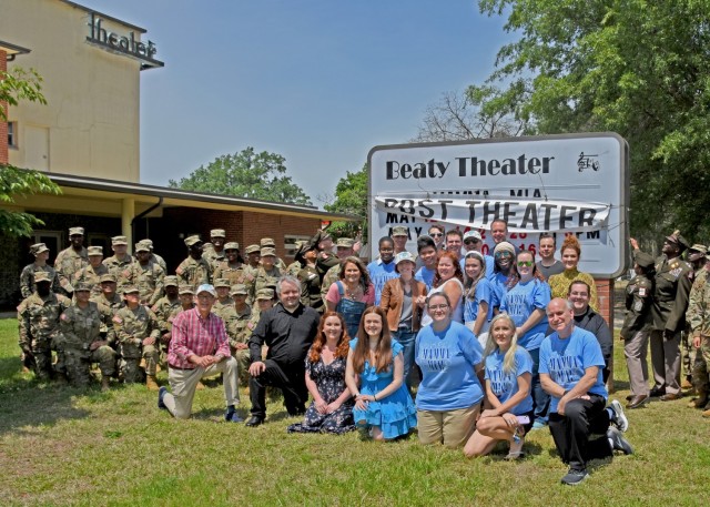 U.S. Army Garrison Fort Gregg-Adams and 244th Quartermaster Battalion command teams unveil the new &#39;Beaty Theater&#39; sign on the marquee of the 1950-built facility during an afternoon ceremony, May 7. Previously known as the &#39;Lee Theater&#39; or &#39;Lee Playhouse,&#39; the redesignation of the facility is part of a larger redesignation effort at the post, which itself recently received new namesakes reflecting the installation&#39;s long history of delivering top-notch military training for Army Sustainers.