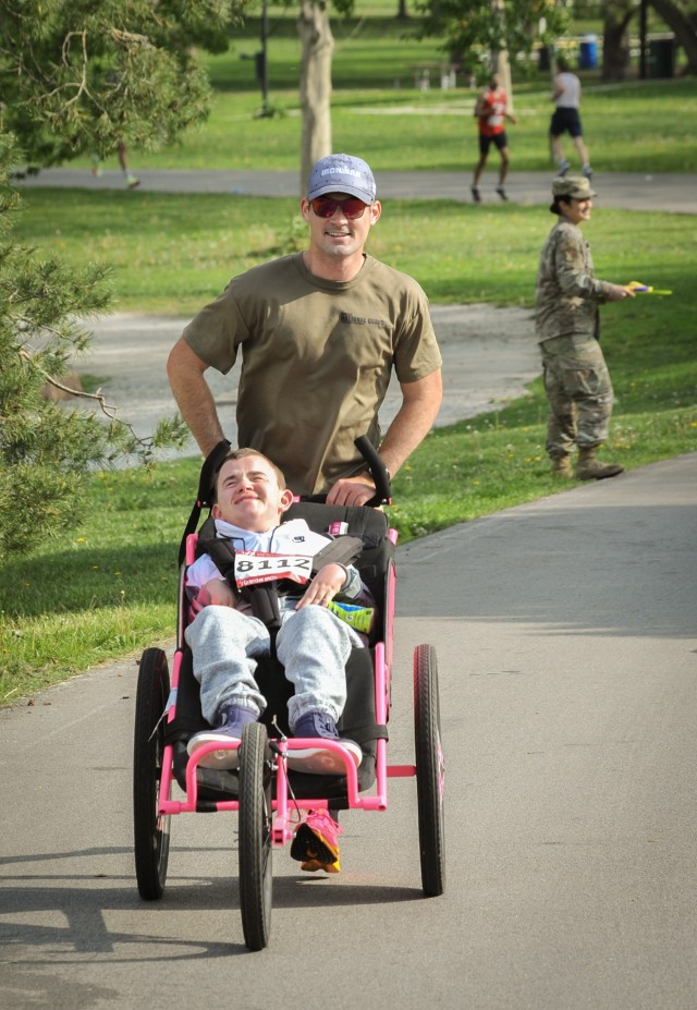 1st Lt. Nicholas Lahr, a UH-60 Black Hawk helicopter pilot with the Kansas Army National Guard’s 1st Battalion, 108th Aviation Regiment, and Samuel Butalla participated in the 46th annual Lincoln Marathon, which also serves as the National Guard Marathon Team trials, May 7, 2023, in Lincoln, Nebraska. More than 200 National Guard Airmen and Soldiers from across the country competed. (U.S. Air National Guard photo by Lt. Col. Kevin Hynes)