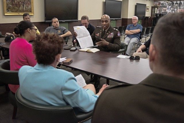 Lt. Col. Shane Doolan, Chicago Recruiting Battalion commander, speaks on Wednesday with civilian aides to the Secretary of the Army during a recruiting breakout session in the Military Police Regimental Room at the John B. Mahaffey Museum Complex. 
