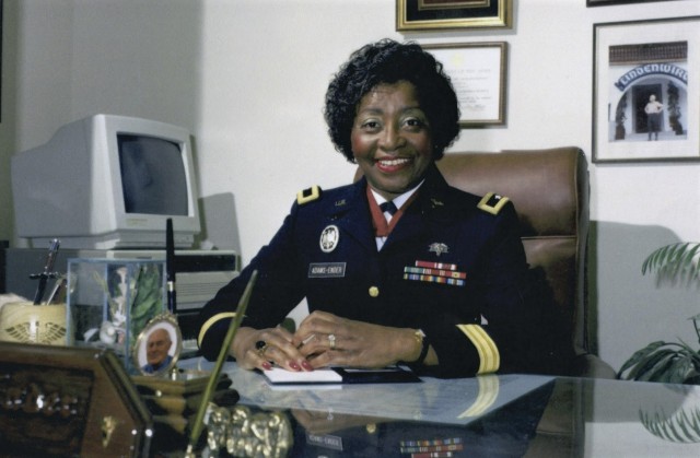 Brig. Gen. Clara Leach Adams-Ender, chief of the Army Nurse Corps, poses for a photo at her desk in Washington, D.C., in 1988. During this time, she faced many challenges, but none greater than getting nurses increased wages for their hard work. 
