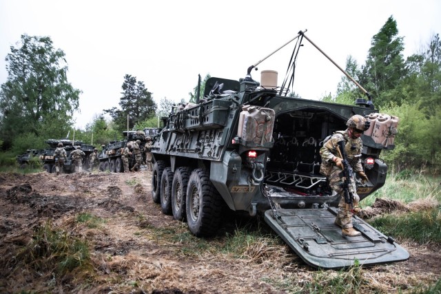 U.S. Soldiers assigned to the Kronos Troop, 3rd Squadron, 2nd Cavalry Regiment, NATO Multinational Division Northeast, participate in the first day of a combined arms live fire exercise during Griffin Shock 23 held at Bemowo Piskie, Poland, May 15, 2023.