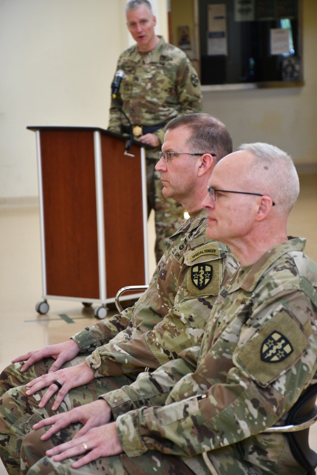 Brig. Gen. Thad Collard, Army Reserve Medical Command Deputy Commanding General, presents his remarks at the CEMARSG change of command ceremony held at Fort Sheridan, Illinois May 7, 2023 as Col. Larry (Jeff) Luedeman, outgoing Central Medical Area Readiness Support Group commander, and Col. Rodger (Dale) Jackson, incoming Central Medical Area Readiness Support Group commander, listen on.