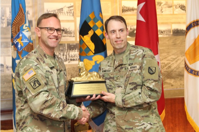 Chief Warrant Officer 2 Edward Hennessy receives  Chief Warrant Officer 5 Rex A. Williams Award