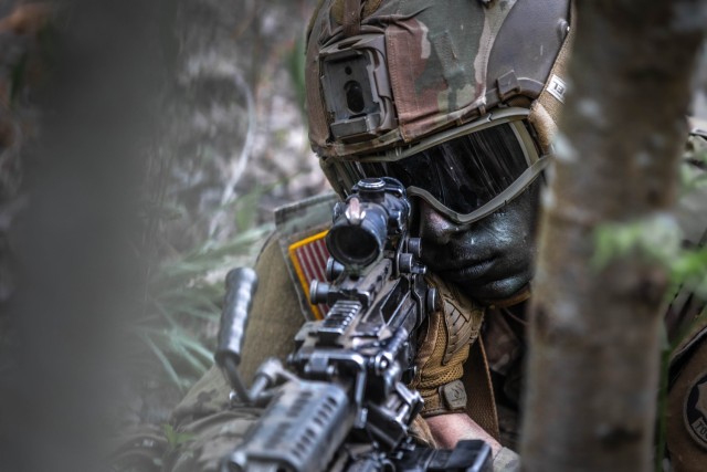 A U.S. Soldier assigned to the Kronos Troop, 3rd Squadron, 2nd Cavalry Regiment, NATO Multinational Division Northeast, participates in the first day of a combined arms live fire exercise during Griffin Shock 23 held at Bemowo Piskie, Poland, May 15, 2023