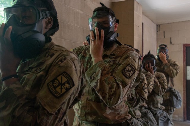 The Cadets of 9th Regiment, Advanced Camp, undergo chemical, biological, radiological, nuclear (CBRN) training at Fort Knox, Ky., July 10, 2022. The Cadets were trained on how to properly put on protective gear before they entered the CBRN confidence chamber. | Photo by Julia Galli, CST Public Affairs Office