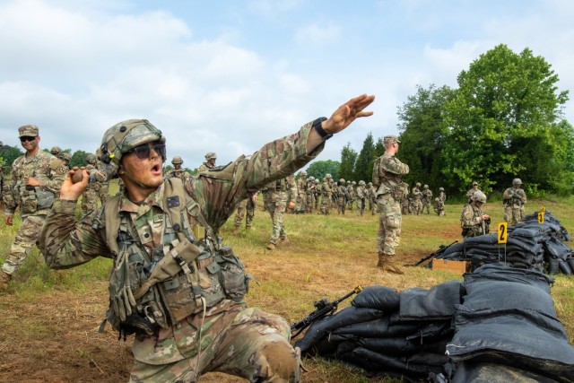 A Cadet from 1st Regiment, Advanced Camp prepares to throw an M69 practice hand grenade during Cadet Summer Training on Fort Knox, Ky., June 8, 2022. Cadets threw six grenades in total only four of which contained an explosive fuse. (U.S. Army photo by Sgt. Kaden D. Pitt)