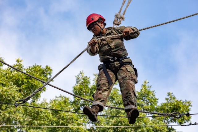 3rd Regiment, Basic Camp Cadets complete several rope courses at the Forest Hills Climbing Complex at Fort Knox, Ky., July 20, 2022. This course allowed Cadets to gain confidence while trusting their peers and the equipment provided. | Photo by Cristina Betz, CST Public Affairs Office