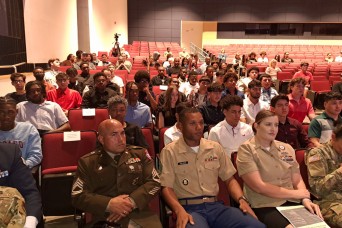 High school ceremony honors new military recruits