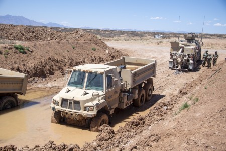 Soldiers of A Company, 501st Brigade Support Battalion, 1st Armored Combat Brigade Team, 1st Armored Division, conduct recovery operations with a Family of Medium Tactical Vehicles, or FMTVA2, wrecker as part of operational testing at Fort Bliss, Texas to determine operational effectiveness of the system and to enable decisions by Army senior leaders.