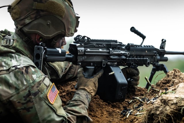 A U.S. Soldier assigned to Lightning Troop, 3rd Squadron, 2nd Cavalry Regiment, NATO Multinational Division Northeast, engages enemy targets with a 249 light machine gun during a combined arms live-fire exercise while participating in exercise Griffin Shock 23 held at Bemowo Piskie, Poland, May 16, 2023. As the framework nation in Poland, Exercise Griffin Shock demonstrates the U.S. Army&#39;s ability to assure the NATO alliance by rapidly reinforcing the NATO Battle Group Poland to a brigade-size unit. 