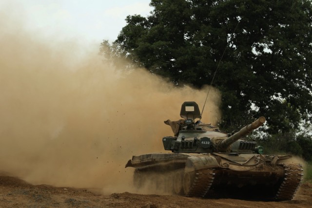NOVO SELO TRAINING AREA, Bulgaria ¬– A Bulgarian T-72 battle tank from 3rd Battalion, 61st Mechanized Brigade, approaches the forward line of troops at Novo Selo Training Area, Bulgaria, during Saber Guardian 21, May 27, 2021. 