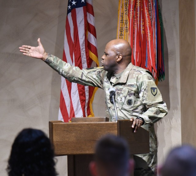 Fort Drum community members observe the National Day of Prayer during a luncheon May 24 inside The Peak Ballroom. The event was hosted by the Fort Drum Religious Support Office team, with Chaplain (Col.) James D. Key, 10th Mountain Division (LI) senior command chaplain, as guest speaker. (Photo by Mike Strasser, Fort Drum Garrison Public Affairs)