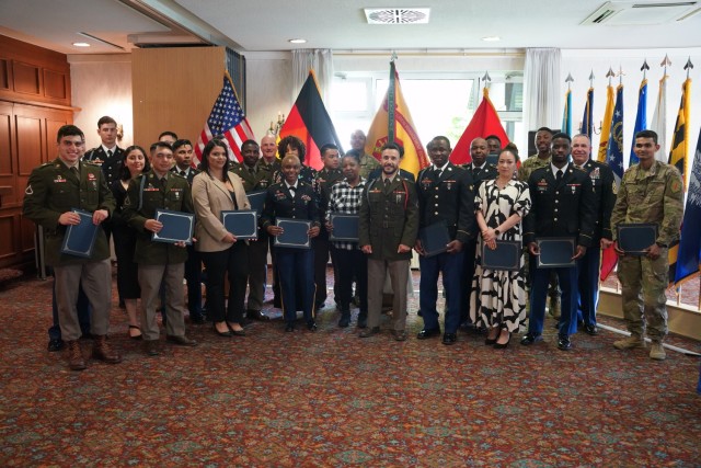 U.S. Army Garrison Bavaria hosted its naturalization ceremony welcoming 25 new citizens of the United States May 22 at the Tower View Conference Center.      