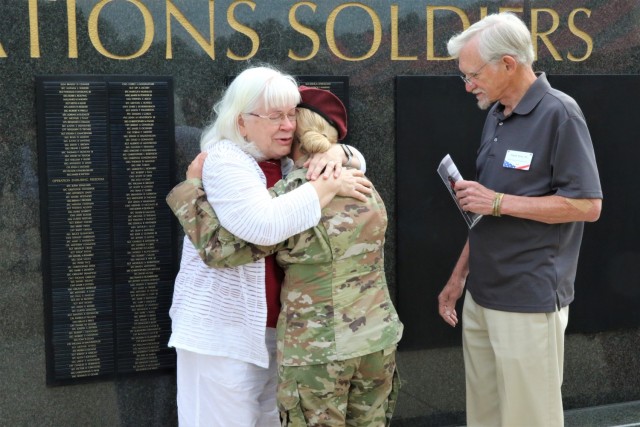 A U.S. Army Special Operations officer hugs the mother of fallen soldier, Army Staff Sgt. Mark Stets Jr., assigned to 4th Psychological Operations Group (Airborne) May 25, on Fort Bragg, N.C.