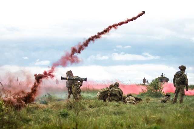 U.S. Soldier assigned to Lightning Troop, 3rd Squadron, 2nd Cavalry Regiment, NATO Multinational Division Northeast, throws a smoke grenade during a combined arms live fire exercise as part of Griffin Shock 23 held at Bemowo Piskie, Poland, May 16, 2023. As the framework nation in Poland, Exercise Griffin Shock demonstrates the U.S. Army&#39;s ability to assure the NATO alliance by rapidly reinforcing the NATO Battle Group Poland to a brigade-size unit. 