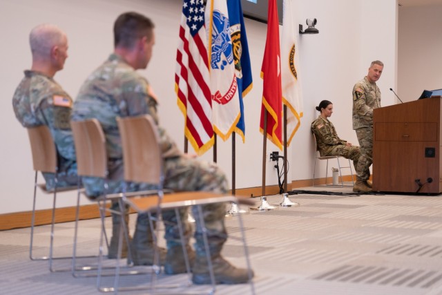 Col. Troy Denomy, outgoing Project Manager Soldier Warrior (PM SWAR), speaks at the PM SWAR change of charter ceremony at the National Museum of the United States Army on May 25, 2023.
