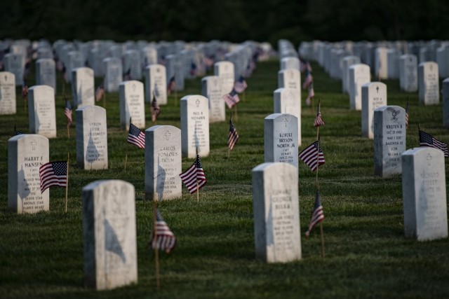 U.S. flags at gravesites in Section 59 of Arlington National Cemetery, Arlington, Va., May 25, 2023. This was the 75th anniversary of Flags In where over 1,000 service members placed more than 260,000 flags at gravesites at Arlington National Cemetery and the U.S. Soldiers’ and Airmen’s Home National Cemetery.