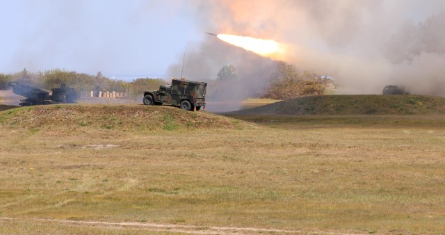 U.S. Army crew with the 1-182nd Field Artillery Regiment Michigan National Guard, fire a rocket with the M142 High Mobility Artillery Rocket System into the Baltic Sea at Skede, Latvia, May 13, 2023. The Soldiers participated in a live fire event in support of the Defender 23 exercise to build readiness and interoperability between U.S., NATO allies and partners. (U.S. Army National Guard photo by Sgt. Patrick Mayabb)