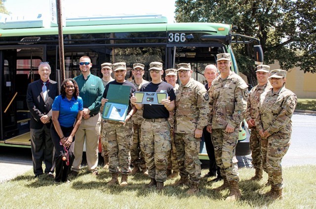 Fort Detrick kicks off Frederick County’s Adopt a Stop initiative by adopting the bus stop outside Veterans Gate, May 17.