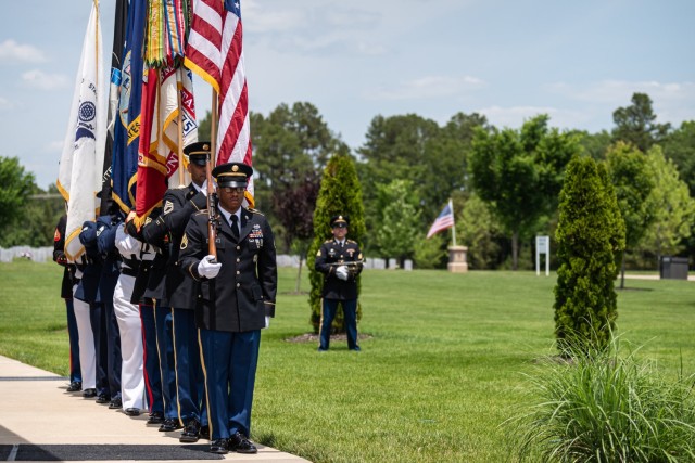 Fort Leonard Wood&#39;s joint-service color guard prepare to present the colors on Monday during the Memorial Day event held at the Missouri Veterans Cemetery – Fort Leonard Wood.